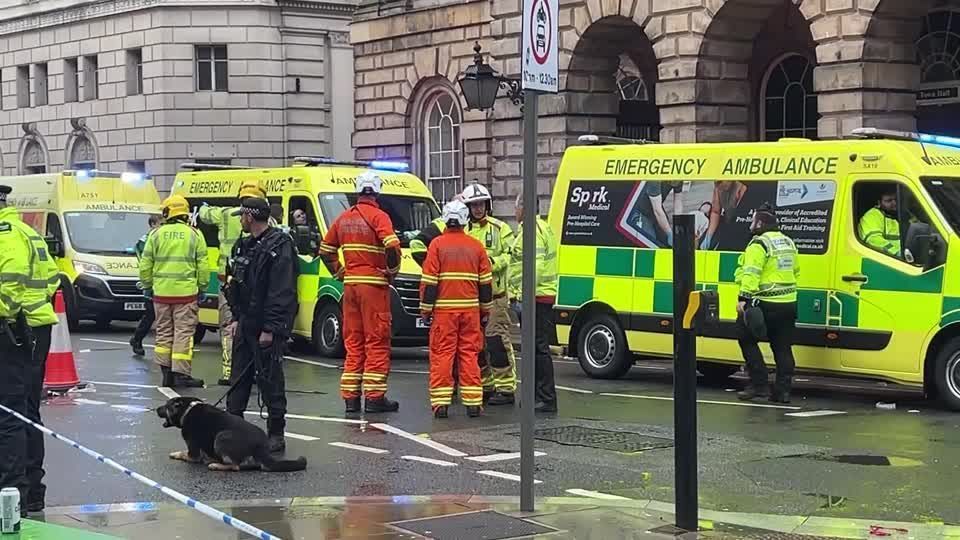 Police respond after car hit crowds at Liverpool's title parade
