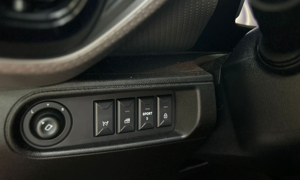 Localização do botão de piloto automático não é boa