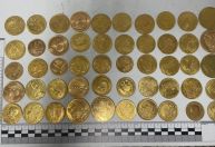 50 moedas de ouro: homem é preso pela PF ao embarcar em aeroporto do RS