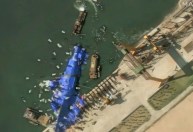 Coreia do Norte envia objetos misteriosos a navio de guerra, revelam fotos
