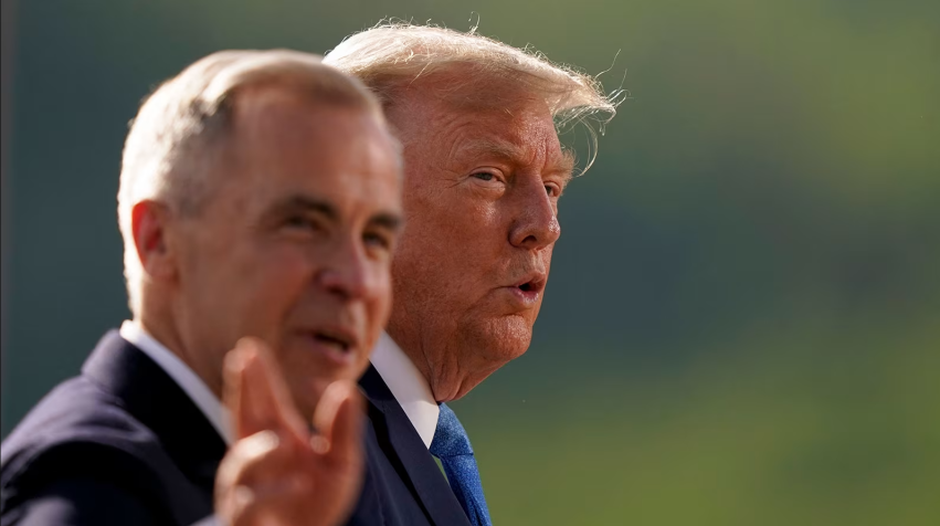 O primeiro-ministro canadense Mark Carney e o presidente dos EUA, Donald Trump, no encontro da Cúpula do G7 • Getty Images