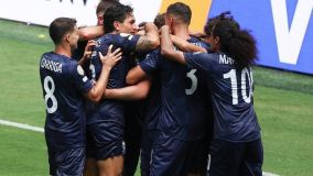 Jogadores do Auckland City comemoram gol sobre o Boca