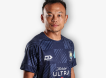 Tong Zhou (Meia) – Líder de programa comunitário e educador ligado ao King’s College