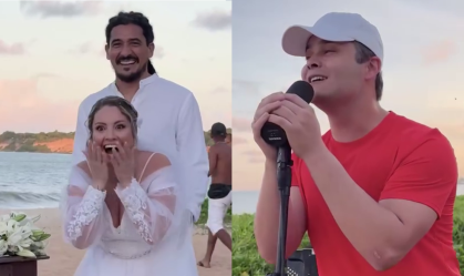 Matheus, dupla de Kauan, "invade" casamento na praia e canta para os noivos