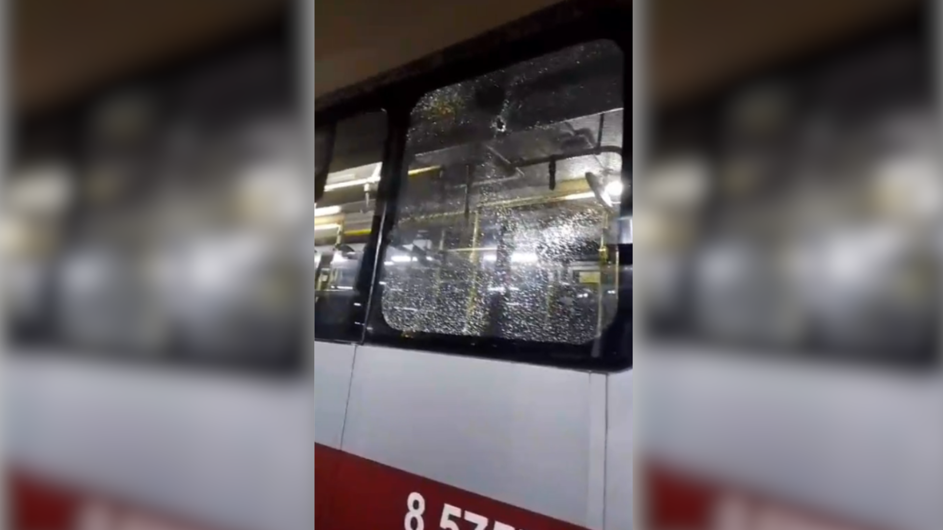 Janela de um ônibus quebrada