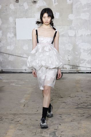 A model parades on the catwalk during the parade of the Cecilie Bahnsen Spring-Summer Women's Collection 2025 as part of Paris Fashion Week on September 25, 2024 in Paris, France • Estrop/Getty Images