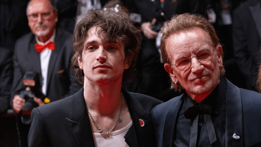 Bono e o filho Elijah, no Festival de Cannes de 2025 • Ernesto Ruscio/Getty Images