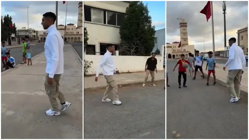 Hakimi joga futebol com crianças em rua do Marrocos