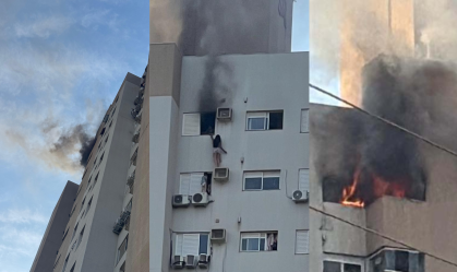 Mulher se pendura em ar condicionado para salvar mãe e criança de incêndio