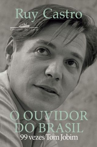 Capa de "O ouvidor do Brasil: 99 vezes Tom Jobim", escrito por Ruy Castro • Divulgação