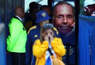 Com jogadores, velório de Miguel Ángel Russo reúne milhares na Bombonera