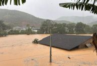 Imagens: Casas ficam embaixo d’água após temporal atingir município de SC