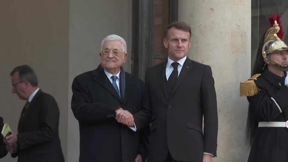 Macron meets with Abbas in Paris to talk about next steps for peace