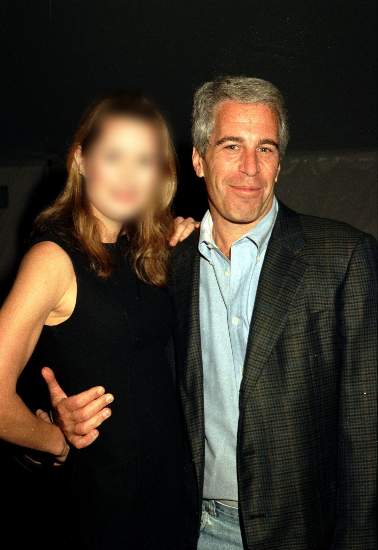 Epstein junto de convidada em Mar-a-Lago • Davidoff Studios/Getty Images