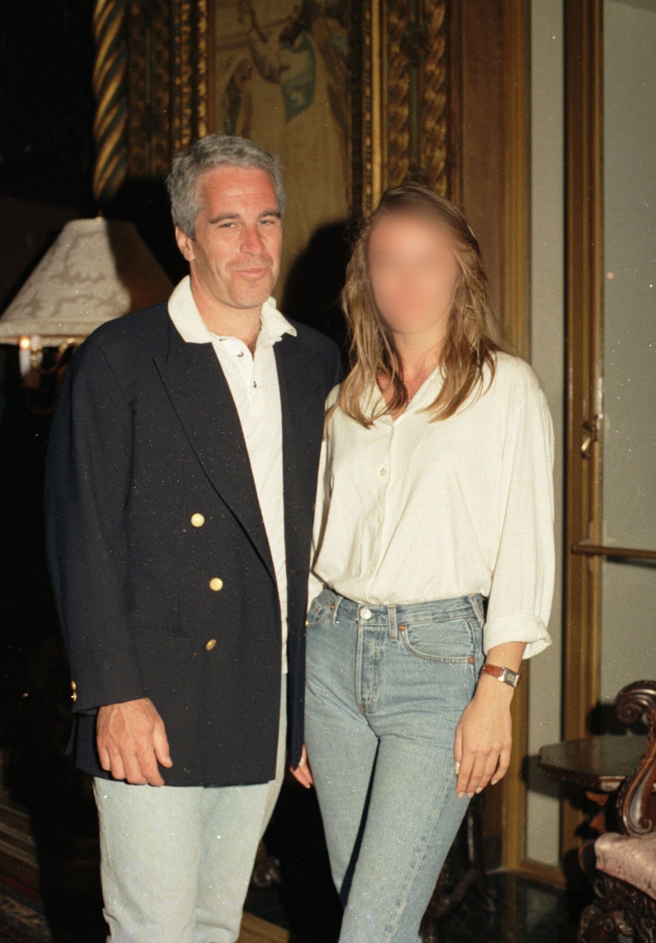 Portrait of American socialite Jeffrey Epstein (1953 - 2019) and Norwegian college student (and future businesswoman) Celina Midelfart as they pose together during a reception (in honor of Tony Bennett) at the Mar-a-Lago estate, Palm Beach, Florida, March 19, 1995. (Photo by Davidoff Studios/Getty Images) • Photo by Davidoff Studios/Getty Images)