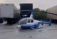 Helicóptero da Band cai na Dutra, na altura de Guarulhos