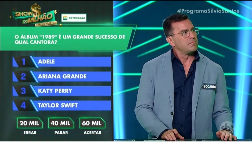 Rodrigo Bocardi em dúvida com pergunta que valia R$ 60 mil no "Show do Milhão" • Reprodução/X