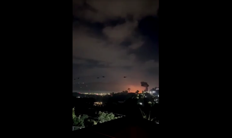 Helicópteros sobrevoam local da explosão em Caracas, na Venezuela • Reuters