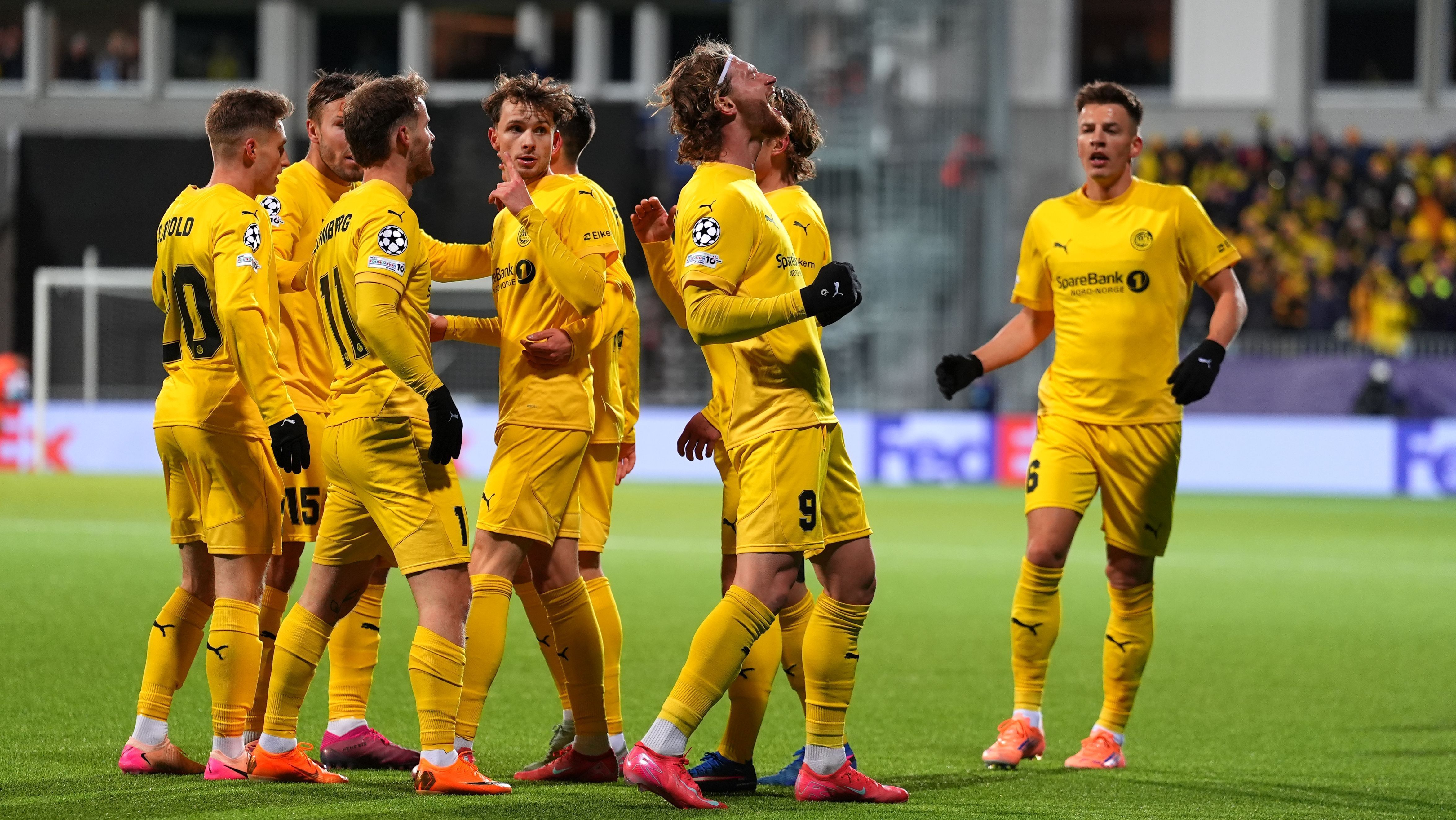 BODO, NORWAY - JANUARY 20: Kasper Hogh of Bodo/Glimt celebrates scoring his team's second goal with teammates during the UEFA Champions League 2025/26 League Phase MD7 match between FK Bodo/Glimt and Manchester City at Aspmyra Stadion on January 20, 2026 in Bodo, Norway. (Photo by Martin Ole Wold/Getty Images)