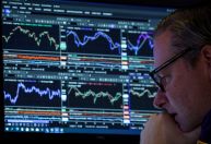 Wall Street opera sem direção única com dados de emprego em foco