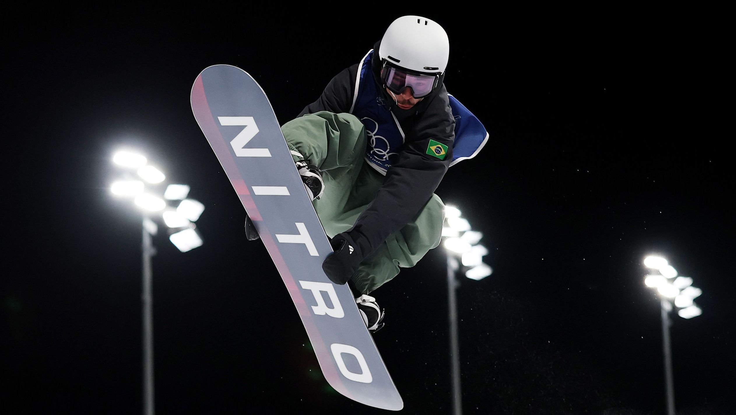 Augustinho Teixeira na primeira descida da etapa classificatória da Olimpíada de Inverno de 2026 • Cameron Spencer/Getty Images