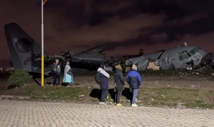 Aftermath of Bolivian cargo plane crash that killed 15 and sparked cash scramble