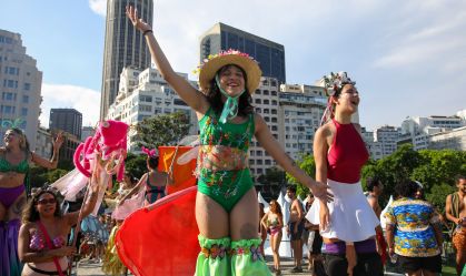Dancers on stilts dance in a carnival parade in Rio de
