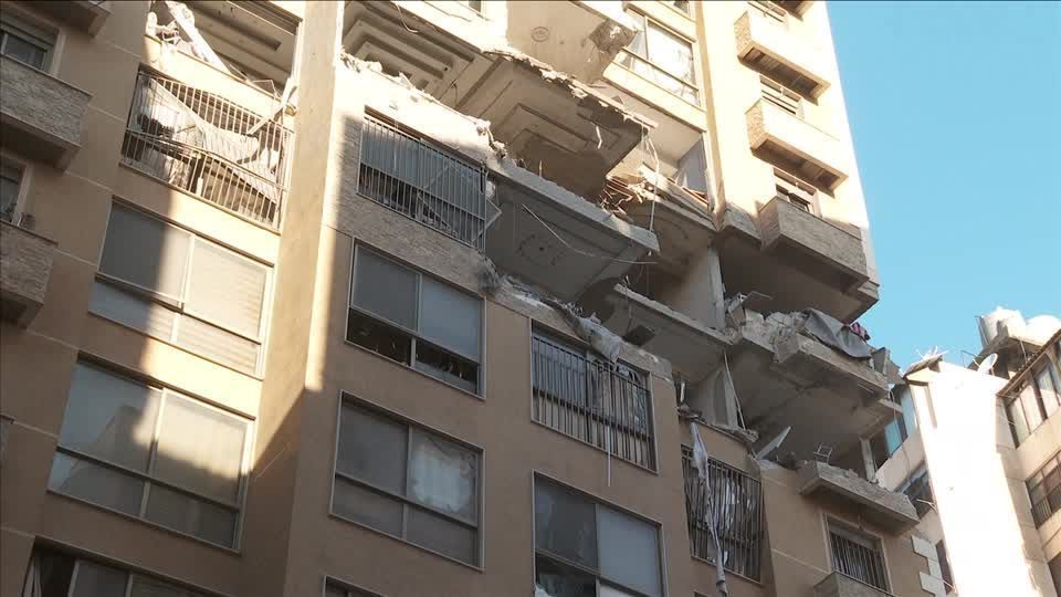 Debris on Beirut's streets after Israel strikes apartment building