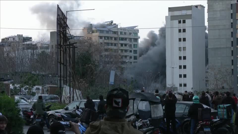 Projectiles hit buildings in central Beirut