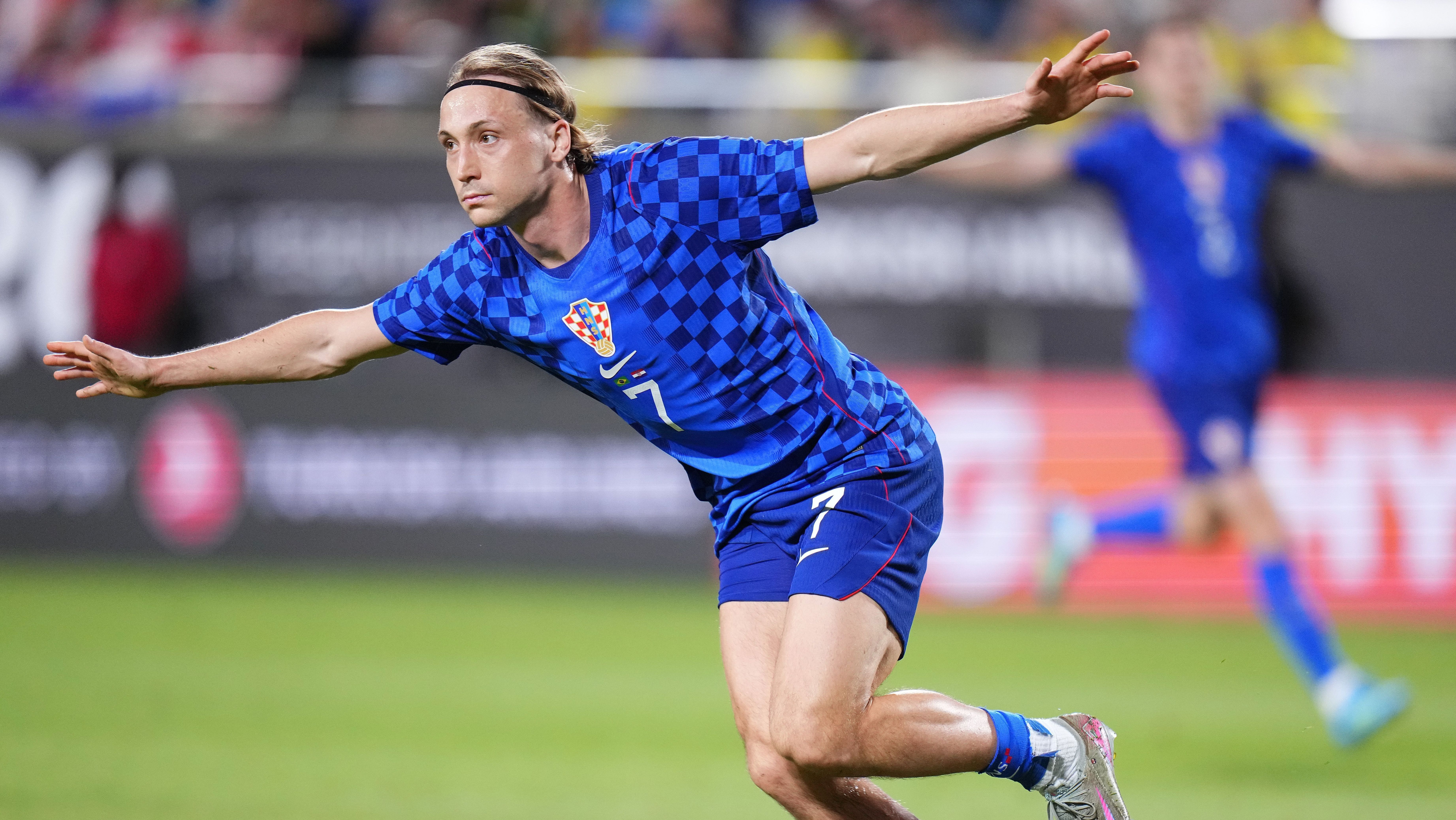 Lovro Majer comemora gol da Croácia contra o Brasil • Rich Storry/Getty Images