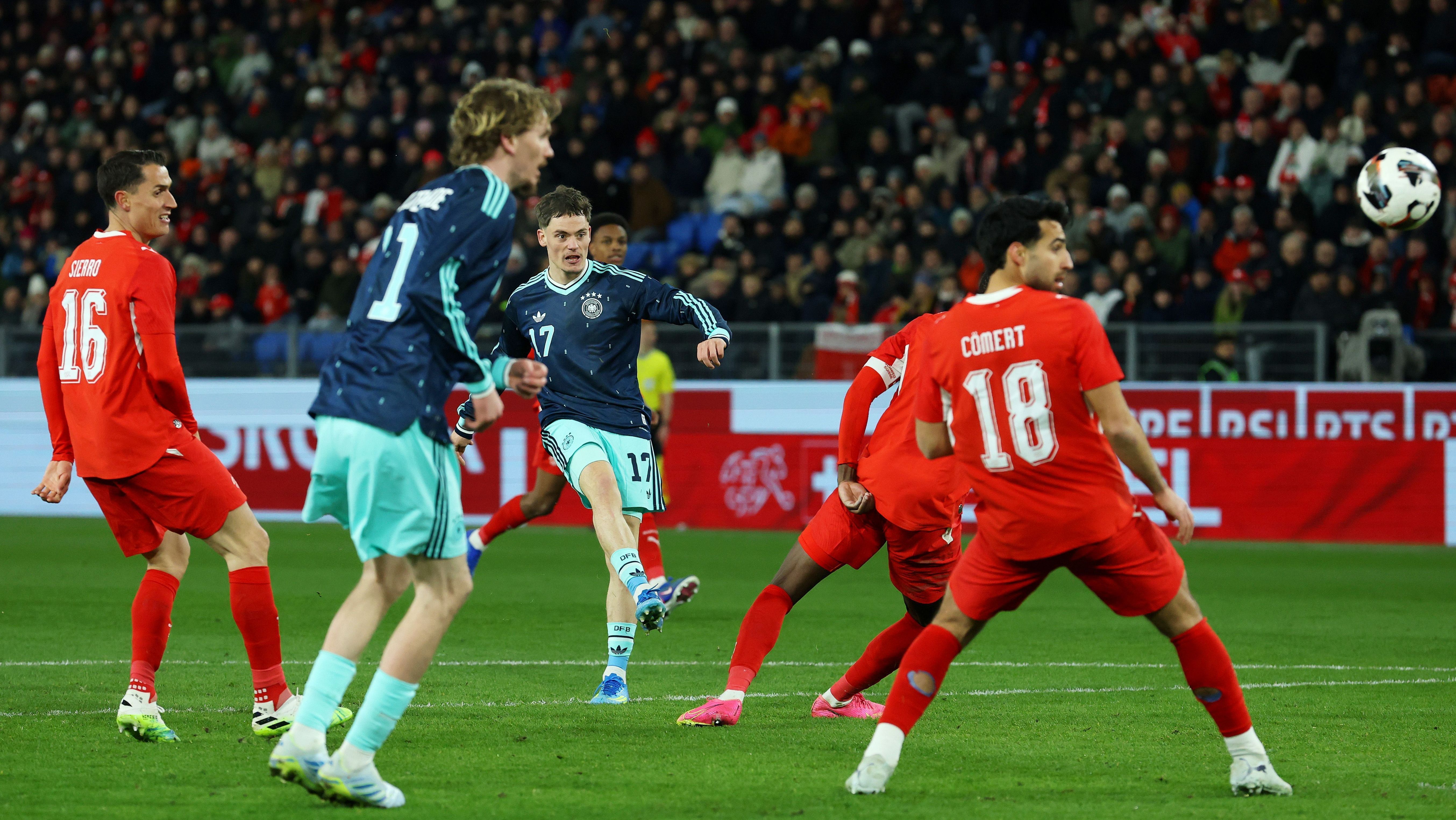 BASEL, SWITZERLAND - MARCH 27: Florian Wirtz of Germany scores his team's fourth goal during the international friendly match between Switzerland and Germany at St. Jakob-Park on March 27, 2026 in Basel, Switzerland. (Photo by Alexander Hassenstein/Getty Images)