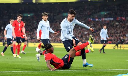 LONDON, ENGLAND - MARCH 27: Piquerez of Uruguay is tackled by Noni Madueke of England during the international friendly match between England and Uruguay at Wembley Stadium on March 27, 2026 in London, England. (Photo by Catherine Ivill - AMA/Getty Images)