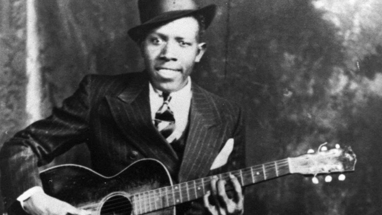 A lenda de que Robert Johnson fez um "pacto com o diabo" surgiu como explicação mítica para seu talento musical extraordinário e repentino • Reprodução