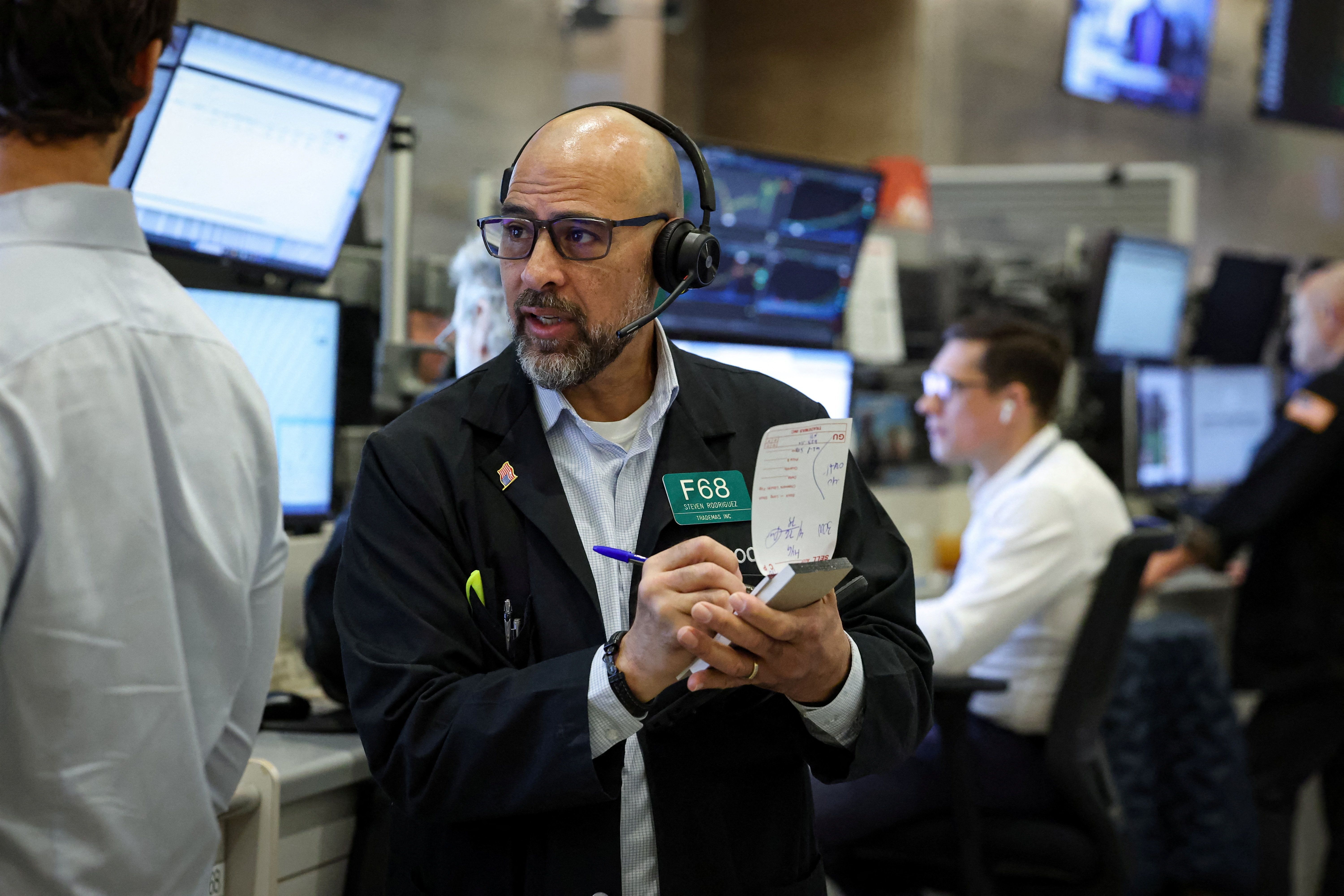 Operadores na bolsa de Nova York em 23/03/2026
