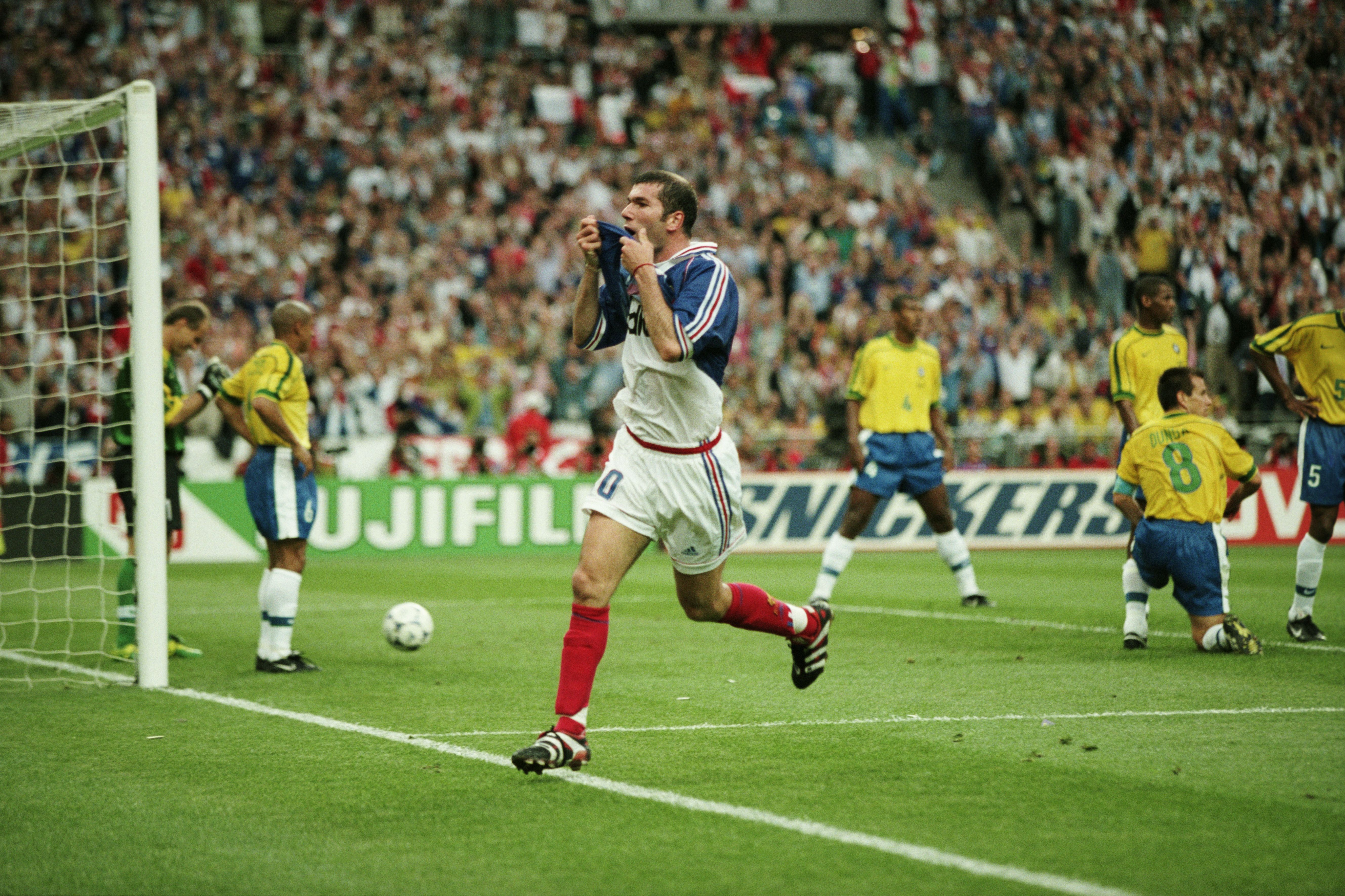 France's Zinedine Zidane celebrates scoring the second goal of the 1998 FIFA World Cup final against Brazil. France won 3-0. | Location: Saint Denis, France. (Photo by Christian Liewig/TempSport/Corbis via Getty Images) • Corbis via Getty Images