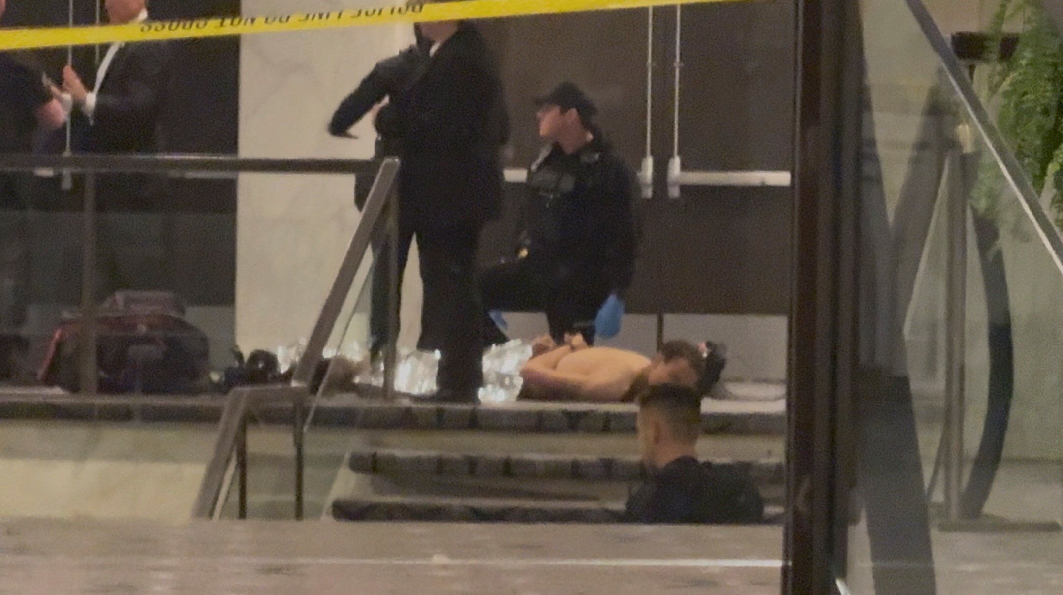 Cole Tomas Allen, a suspect in the shooting incident at the White House Correspondents' Association dinner, lies on the floor after being detained by law enforcement personnel, in Washington, D.C., U.S., April 25, 2026, in this screengrab from a video. Bill Frischling/ CQ Roll Call/Handout via REUTERS THIS IMAGE HAS BEEN SUPPLIED BY A THIRD PARTY. NO RESALES. NO ARCHIVES. MANDATORY CREDIT. VERIFICATION Reuters was able to verify the location from flooring, lights, television, and windows that match corroborating footage. Reuters was able to confirm the date from file data. The armed man fired at a Secret Service agent, an FBI official told Reuters.
