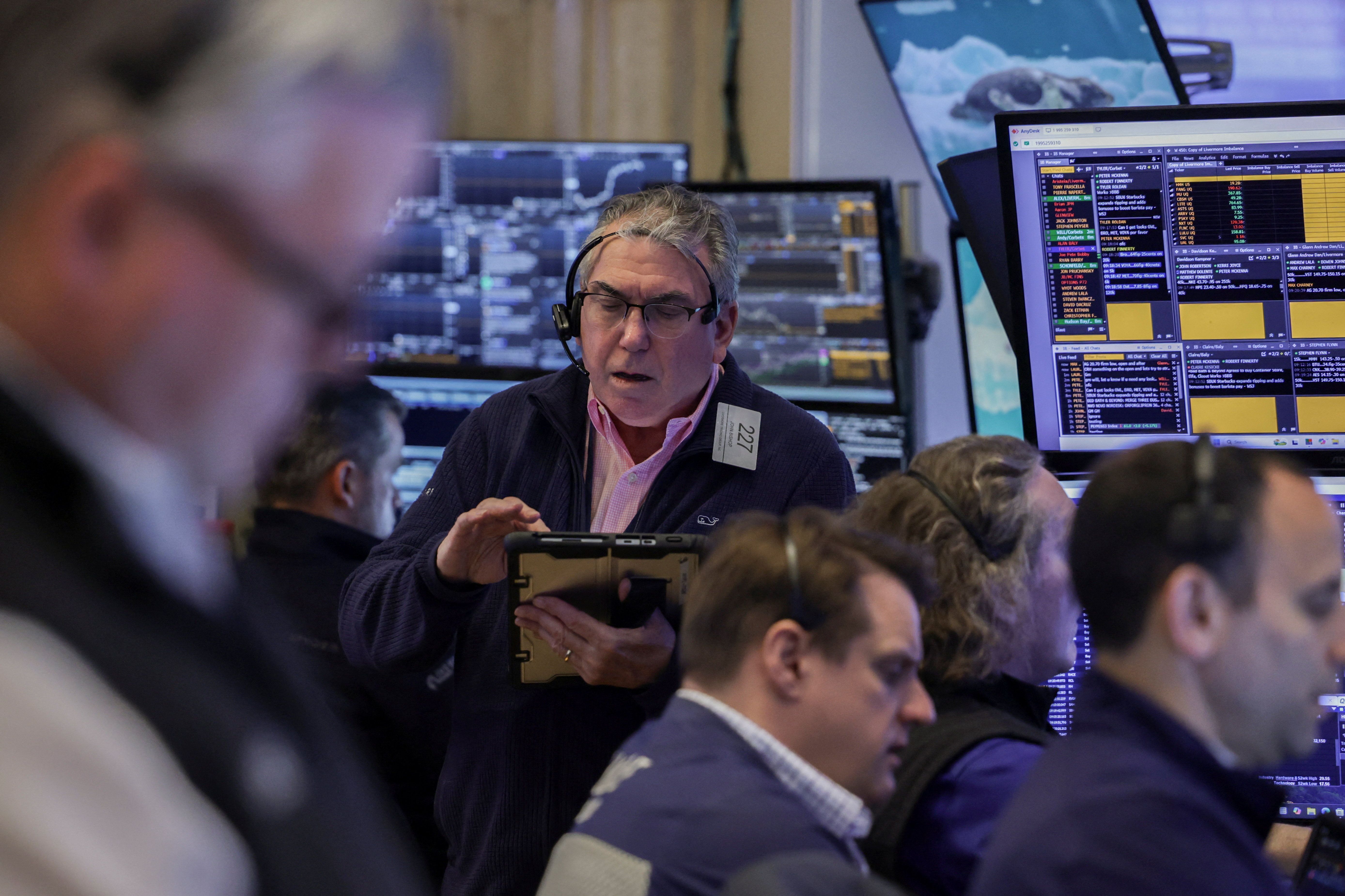 Traders na Bolsa de Valores de Nova York em 2 de abril de 2026