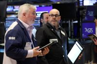 Wall Street opera em alta após decisão do Fed e balanços de big techs