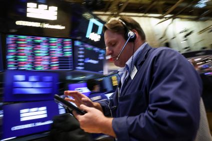 Operador na bolsa de Nova York em 20 de abril de 2026