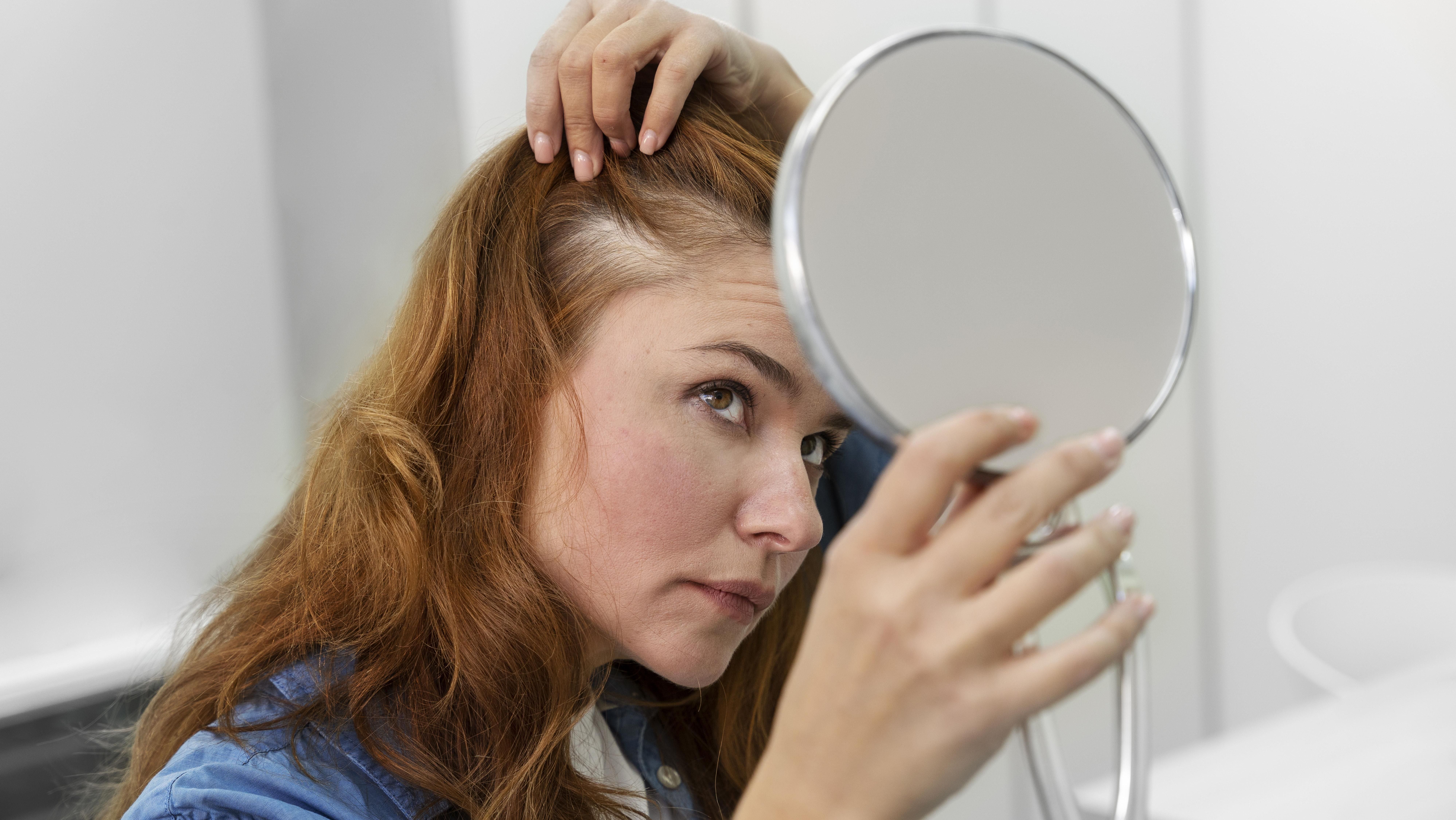 woman-getting-hair-loss-treatment-clinic