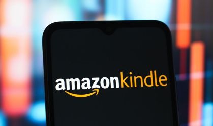 In this photo illustration, the Amazon Kindle logo is seen