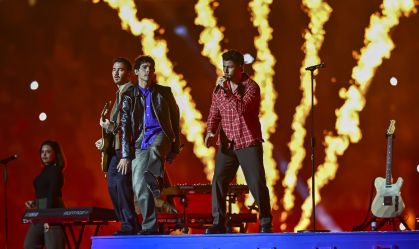 The Jonas Brothers perform during the halftime show at the