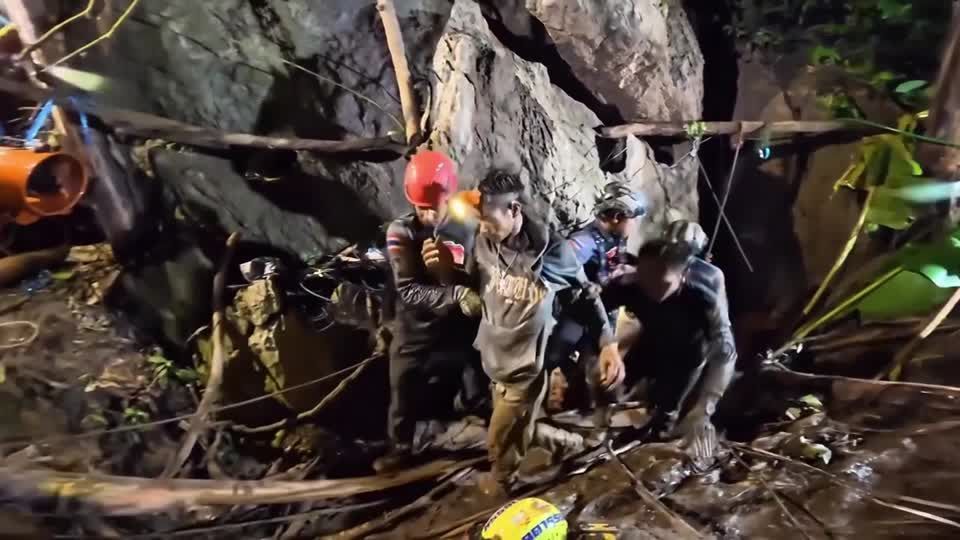 Rescuers pull out first trapped person from flooded Laos cave