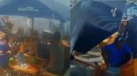 Ressaca no RJ: onda invade quiosque no Mirante do Leblon e assusta clientes