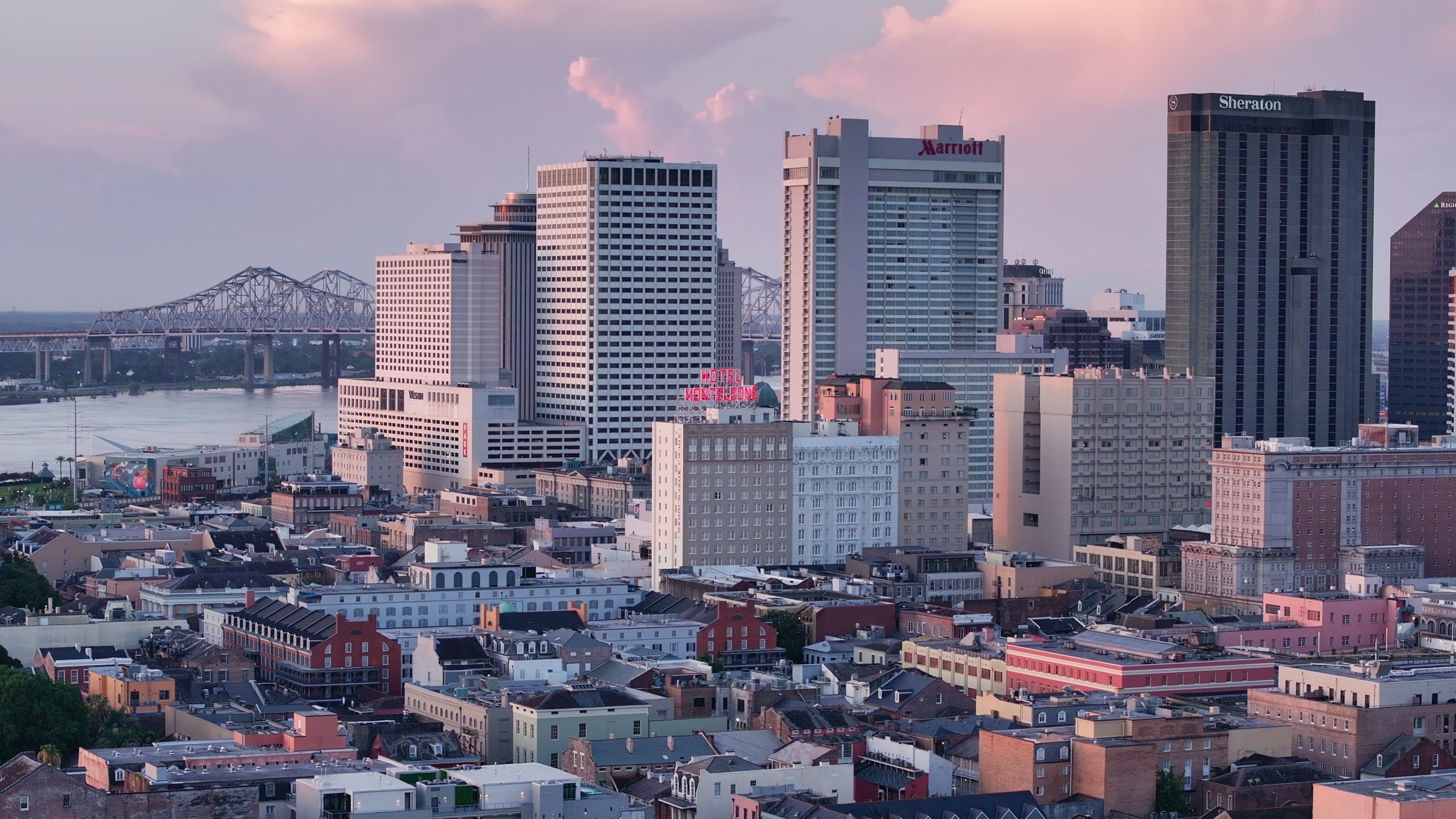 Downtown New Orleans Skyline and Bridge at Sunrise in Louisiana