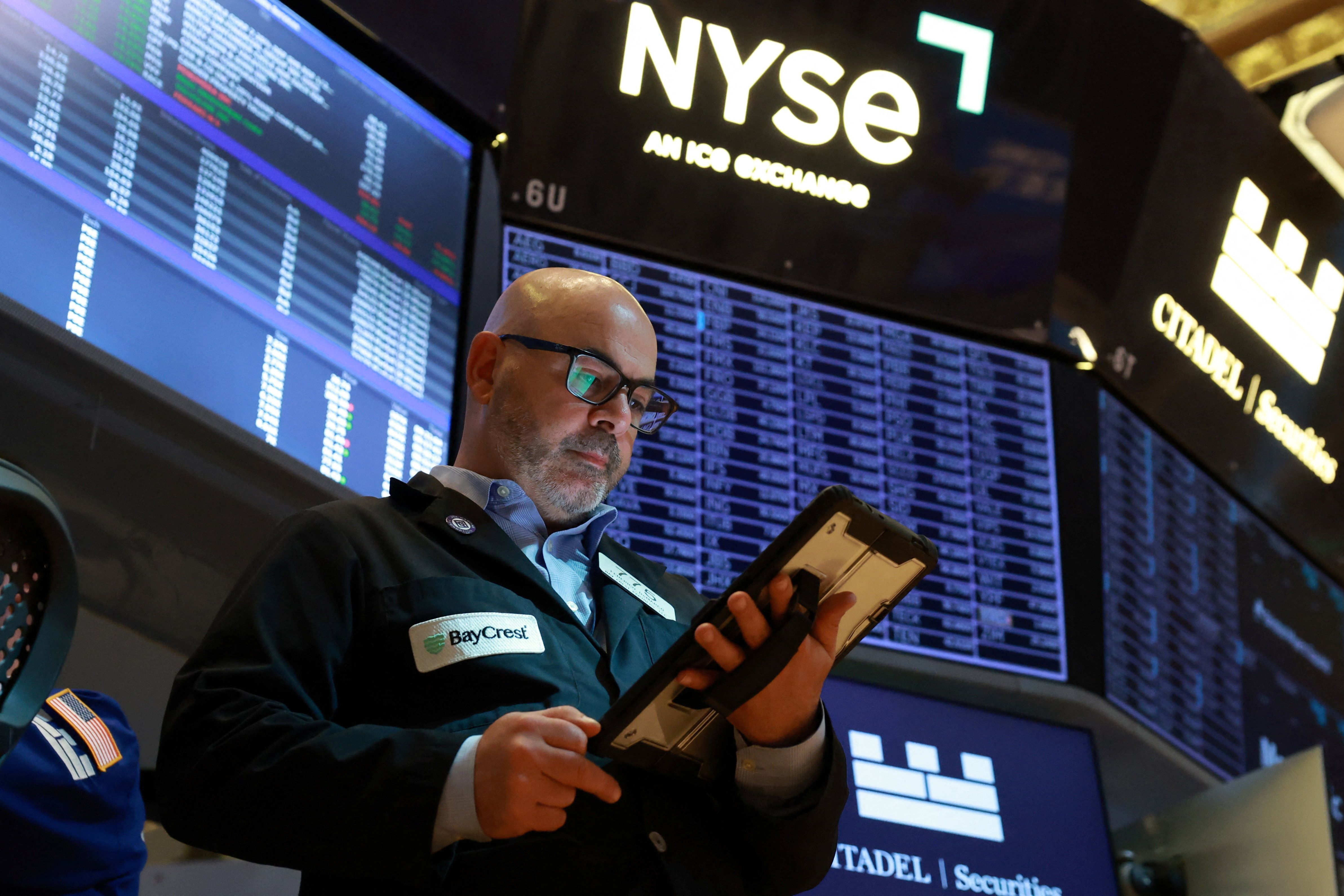 Operadores na bolsa de Nova York em 26 de maio de 2026