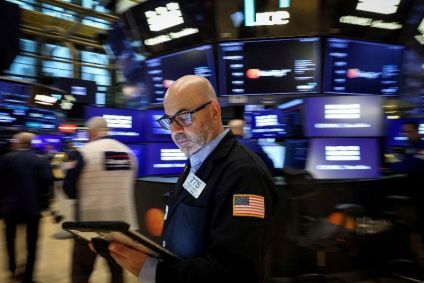 Operadores na bolsa de Nova York em 7 de maio de 2026