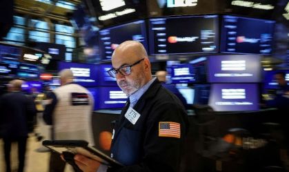 Operadores na bolsa de Nova York em 7 de maio de 2026