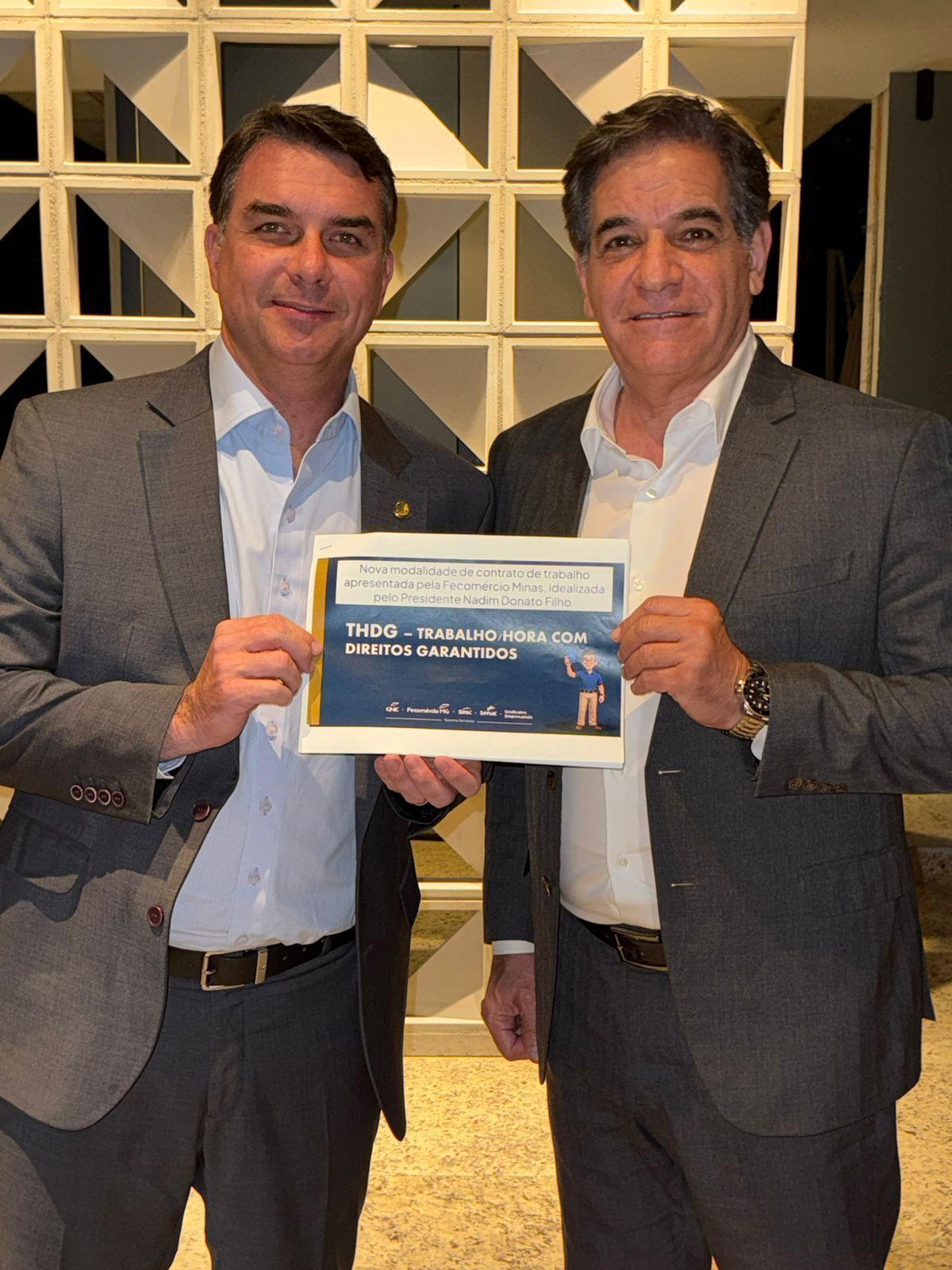 Senador Flávio Bolsonaro (PL-RJ) e Nadim Donato, presidente da Fecomércio-MG • Divulgação