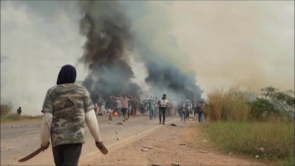 Gunfire wounds police as Bolivian forces clear highway after weeks of blockades